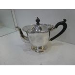 A silver tea pot on pedestal foot hallmarked Birmingham 1906, with decorative edge, approx 10.75ozt,