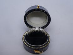 Beautiful 18ct gold ring inset with 6 baguette cut diamonds and 12 small brilliant cut diamonds, siz