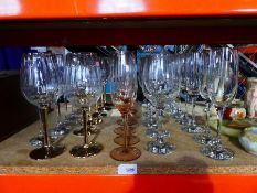 A selection of modern glass champagne flutes, and wine glasses