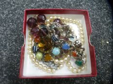 A small collection of costume jewellery including a hardstone bracelet, brooch, pearls etc