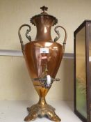An old copper Samovar in the form of two handled urn