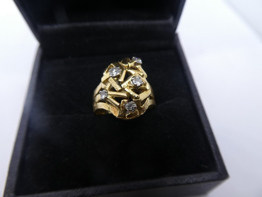 Unusual geometric design 18ct yellow gold ring with 5 diamonds incorporated in the design, marked 18
