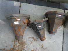 Three vintage cast iron hoppers