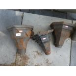 Three vintage cast iron hoppers