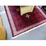 A modern Afghan rug decorated geometric squares, 251cm x 168cm