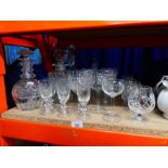 Selection of cut glass decanters and glasses