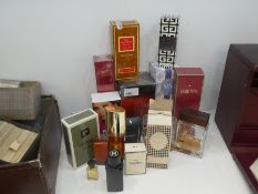 A small collection of perfume and aftershave