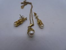 9ct yellow gold neckchain hung with a pearl pendant and matching pair of drop earrings marked, 9ct,