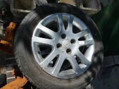 A set of four Honda alloy wheels and tyres by Michelin 195/60