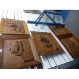 A set of 5 carved wooden wall plaques of sailing boats