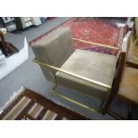 A modern open armchair having a gilt frame