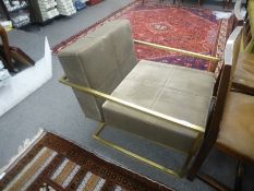 A modern open armchair having a gilt frame