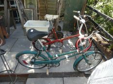 Two vintage bikes, one marked Raleigh RSW 16 and one marked Griffin