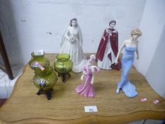 Two Royal Worcester figures of Queen Elizabeth II two other figures and three Loetz style glass vase