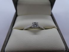 Boxed, Platinum solitaire diamond ring, size P, carat size approx 0.40 marked 950, in original Golds