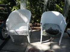 Two white wicker chairs