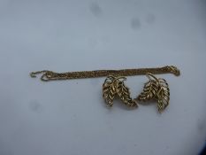 Pair of yellow metal leaf design earrings, unmarked and yellow metal neckchain, unmarked approx 8g