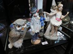 Various Lladro and Nao figures and three collectors plates