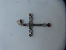 A Continental silver cross inset with moonstone