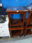 Pair of matching mahogany square two tier coffee tables, with glass inserts