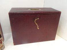 An old red leather stationery box by John Pound & Co., London