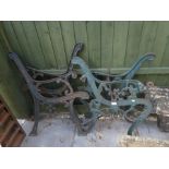 Two pairs of cast iron bench ends