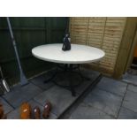 Large round marble table on metal round base