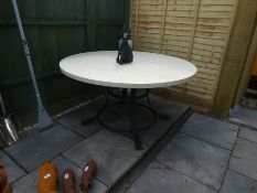 Large round marble table on metal round base