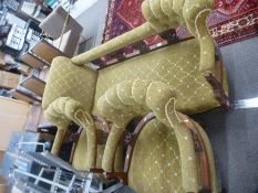 A late Victorian walnut chaise longue, having open back and a pair of matching tub chairs