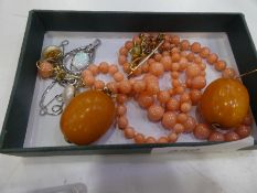 Pair of yellow metal earrings, hung amber beads, gold brooch set with seed pearls, etc