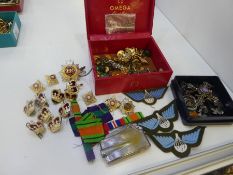 Red Omega 'Constellation' watch box containing badges, buttons, silver costume jewellery, etc