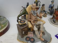 Capodimonte 'The Music Lover', a seated gentleman listening to his music