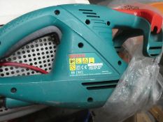 Electric Bosch strimmer and hedge cutter
