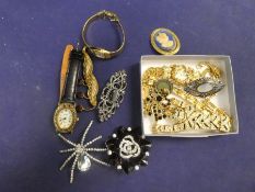 Small quantity of costume jewellery including brooches, Wedgwood pendant, watches, etc