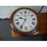 An old mahogany fusee wall clock, the dial marked Prescot Clock Co, 1939, with military arrow, dial