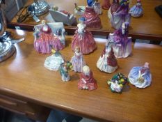 A quantity of Royal Doulton figures and a Beswick pheasant ashtray - 10