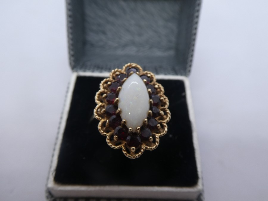 Victorian 9ct yellow gold Marquise cut white Opal set ring surrounded garnets, size Q/R, 5.1g