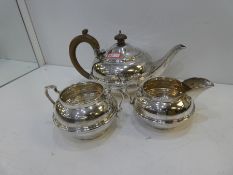 A silver tea set comprising of a tea set and two jugs.  Nice, heavy set, hallmarked London 1933, Cha