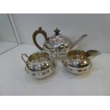 A silver tea set comprising of a tea set and two jugs.  Nice, heavy set, hallmarked London 1933, Cha