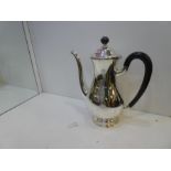 A large heavy silver teapot, Swiss silver hallmarked Jezler 800, with a pedestal foot and with mater