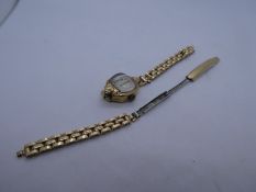 Vintage ladies 9ct yellow gold cased wristwatch, marked 375, with a rolled gold strap, gross weight