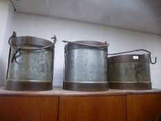 Three milk buckets