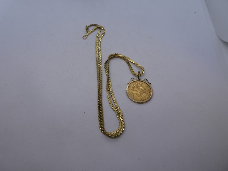 Unmarked yellow metal neckchain, hung with 9ct mounted 1911 Young George half sovereign, gross weigh