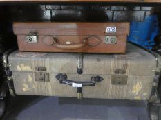 Vintage bamboo bound travelling case and leather suitcase, one containing vintage wedding dress and