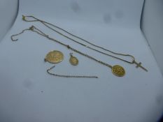 9ct yellow gold cross on chain, marked 375, gold circular pendant on yellow metal chain AF, another