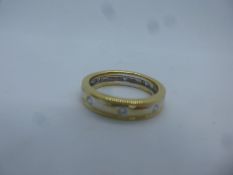 18ct yellow gold wedding band, set with 8 small diamonds, size O, 5.7g