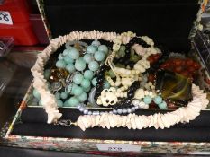Jewellery box containing various bead and glass and hardstone necklaces, etc