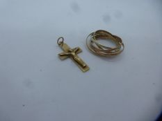 9ct yellow gold ring comprising 6 gold interlocking bands, approx 2g and a 9ct yellow crucifix penda