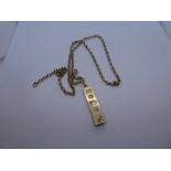 9ct yellow gold bullion bar pendant, 4cm, hung on 9ct yellow gold belcher chain, both marked 375, 57