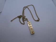 9ct yellow gold bullion bar pendant, 4cm, hung on 9ct yellow gold belcher chain, both marked 375, 57